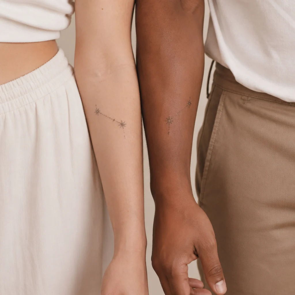 Two matching fine-line Aries constellations on paired forearms with mirrored star placement